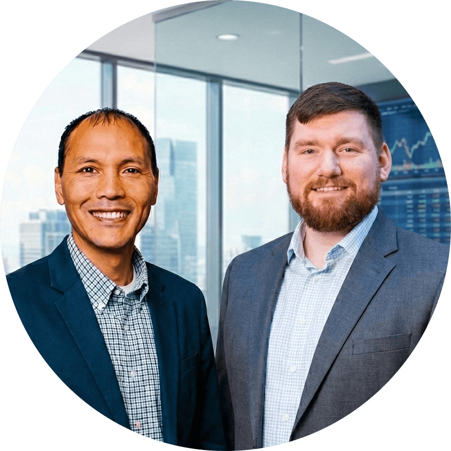 Tom Suvansri and Bobby Mucka strategic wealth planning advisors, in a modern office